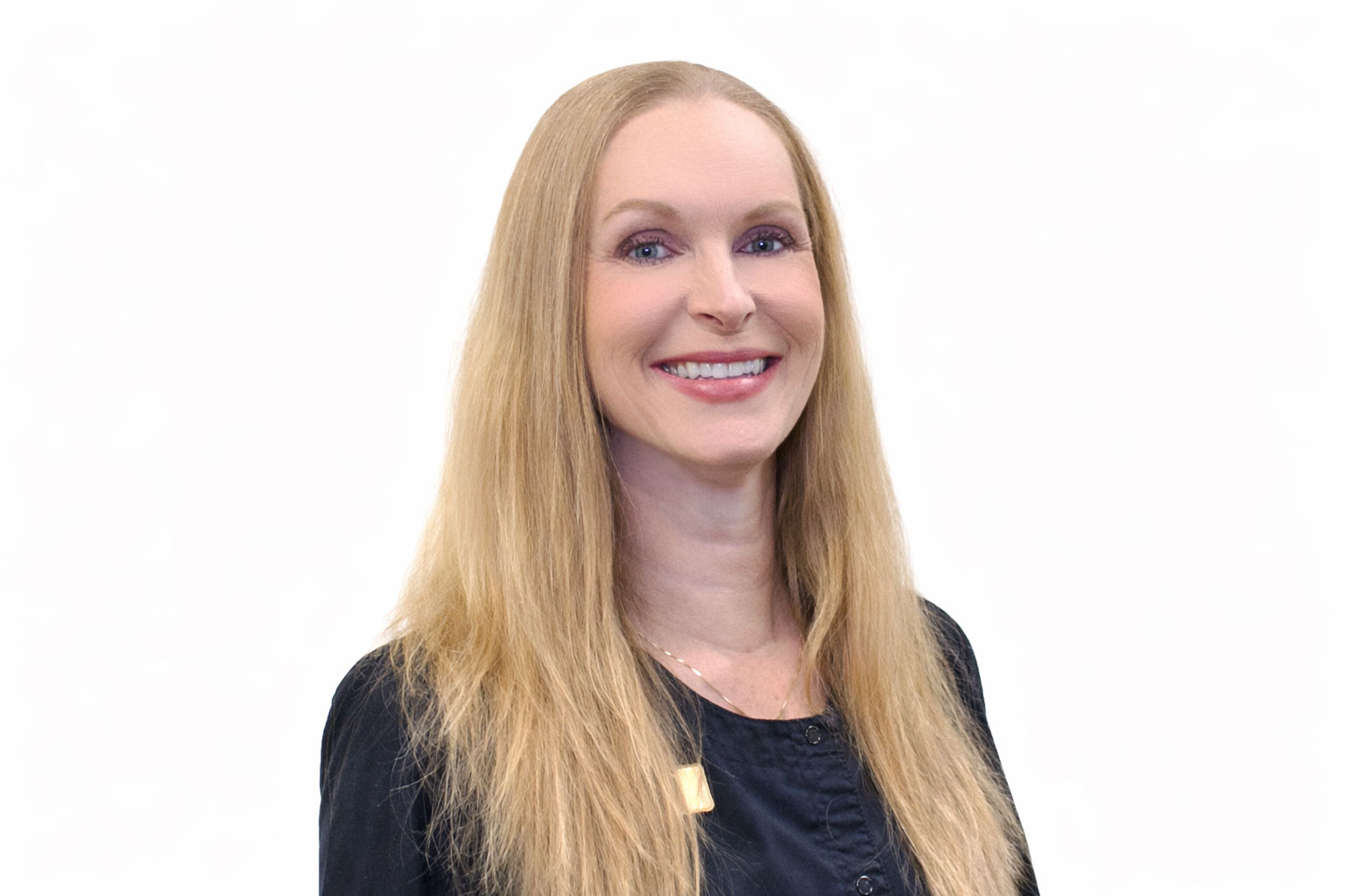 Headshot of dental hygienist, Colleen.